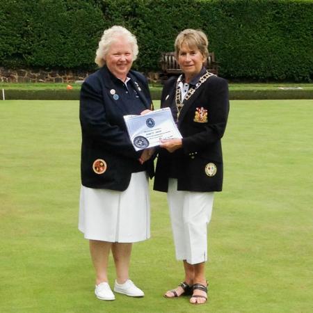 Francis Drake Bowls Club, Hilly Fields, Brockley, SE4 1QE. Jeanette receiving her County badge from the Kent Ladies President
