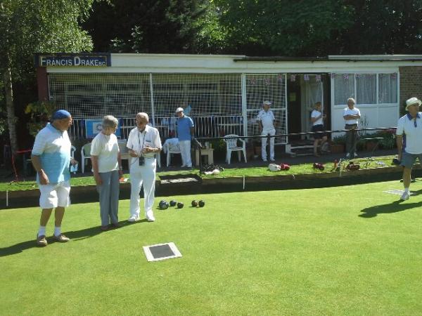 Francis Drake Bowls Club, Hilly Fields, Brockley, SE4 1QE. Wear blue in support of cancer research or pay a fine. Ron sports a nifty blue sunhat!